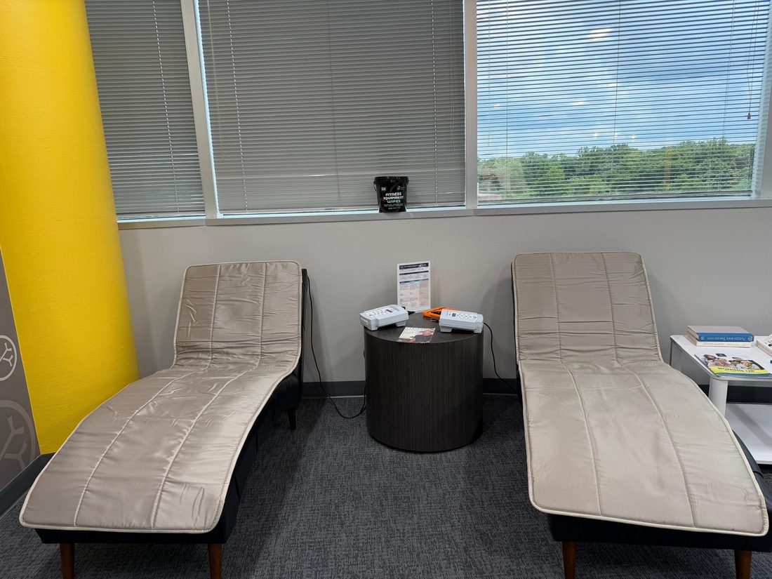 PEMF Therapy mats on two loungers at OsteoStrong Tysons Corner